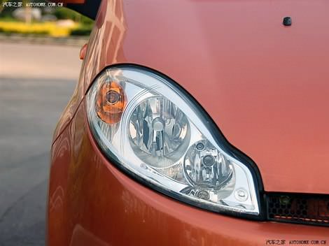 фото деталей внешности китайского авто Чери А1 Кимо цвета оранжевый металлик - Chery A1 Kimo orange color