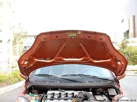 фото деталей внешности китайского авто Чери А1 Кимо цвета оранжевый металлик - Chery A1 Kimo orange color
